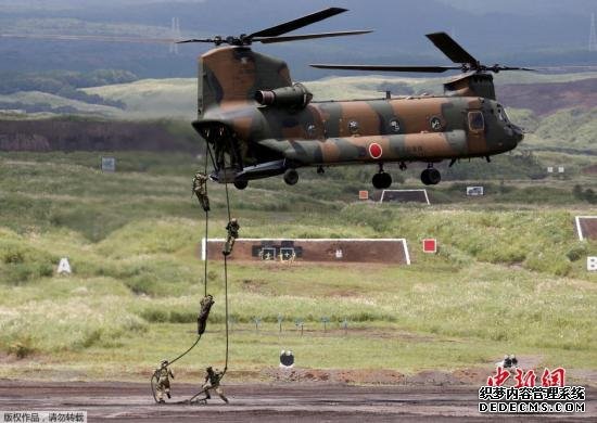 日美在北海道展开共同训练 冲绳坠机事故机型参加